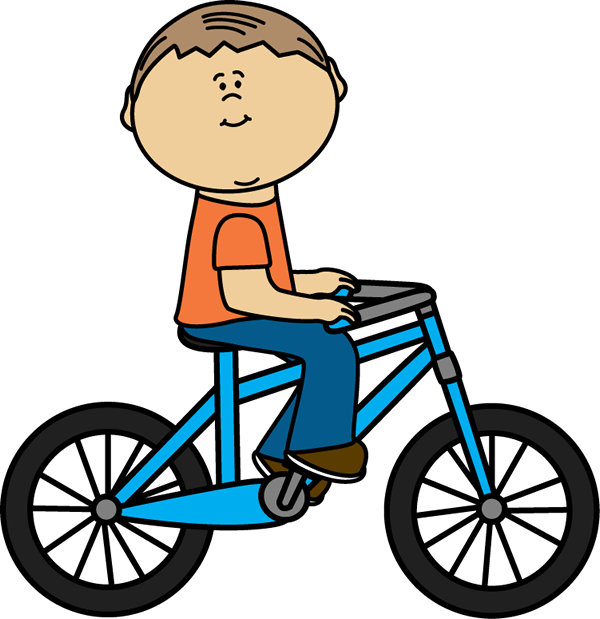 Boy riding bicycle.