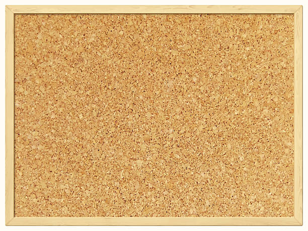 Cork board with wooden frame isolated on white background