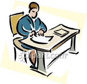 A Person Writing At a Desk
