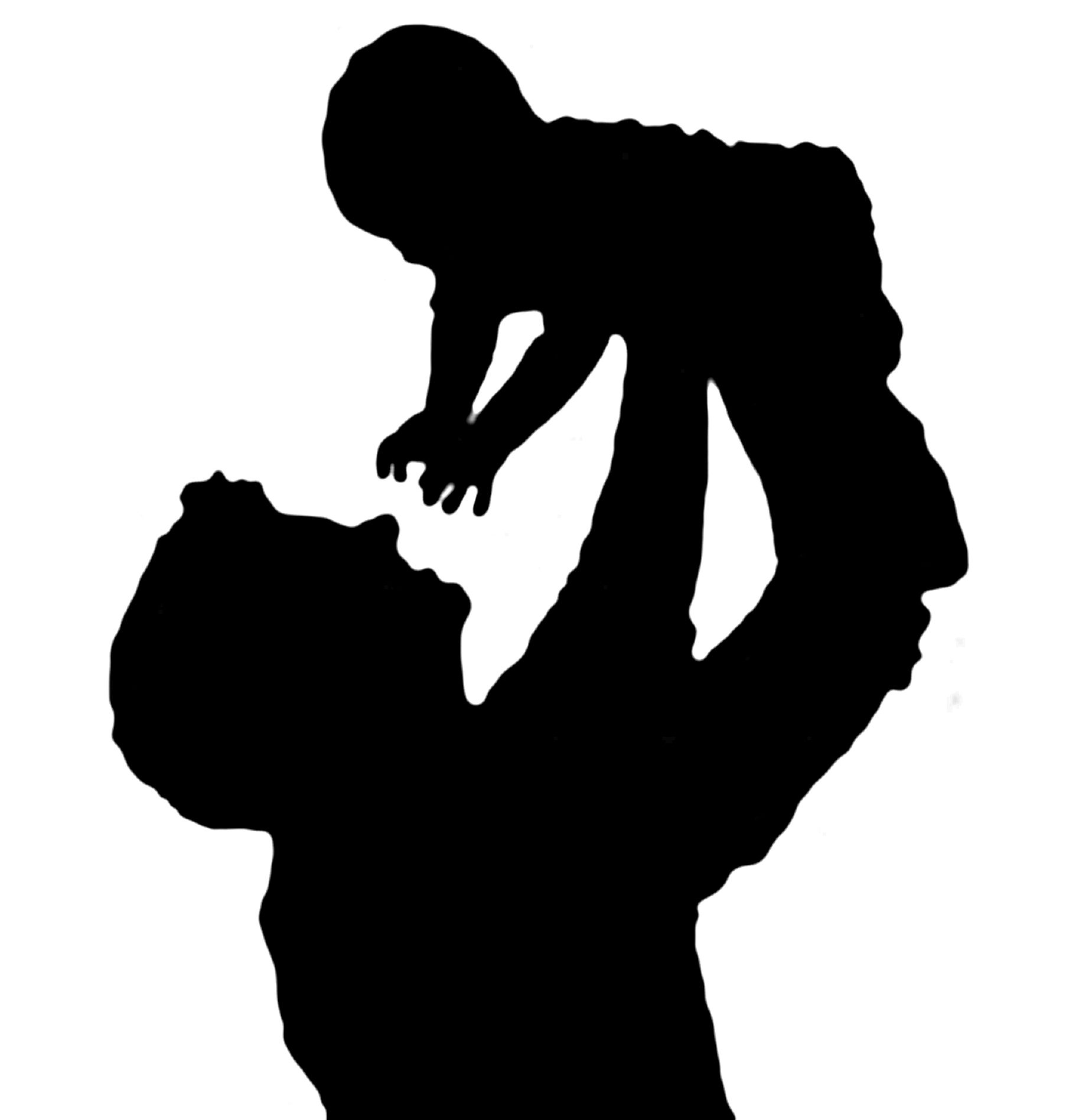 Silhouette of a father holding his child