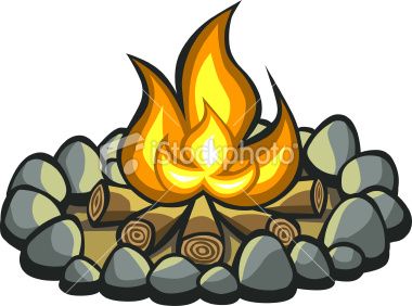 A traditional circle of stone campfire with stones, logs and