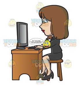 A Woman Using Her Office Computer