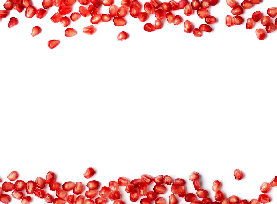 Fresh Pomegranate Seeds Border On White Background by Jill Fromer