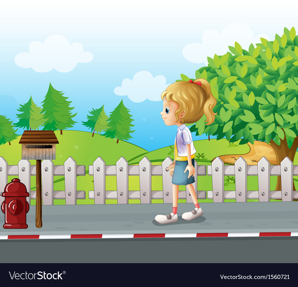A lady walking in the street alone