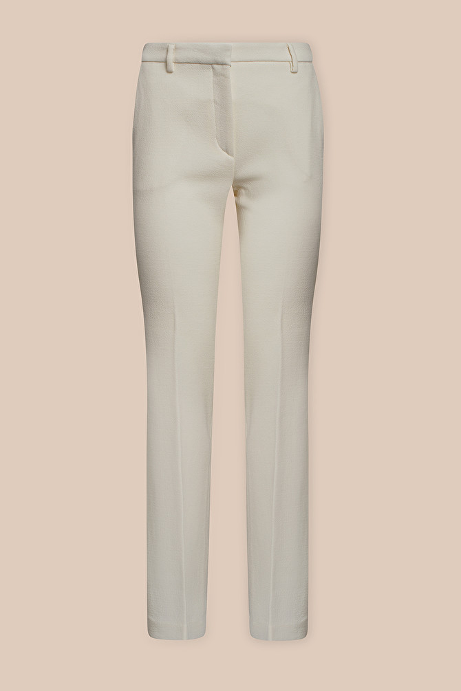 White flared trousers.