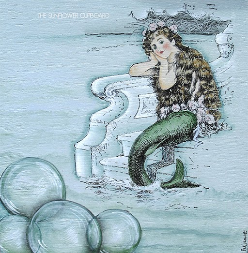 Vintage mermaid art.